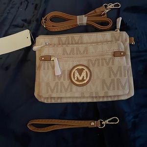 BNWT MKF Cross body with a wristband